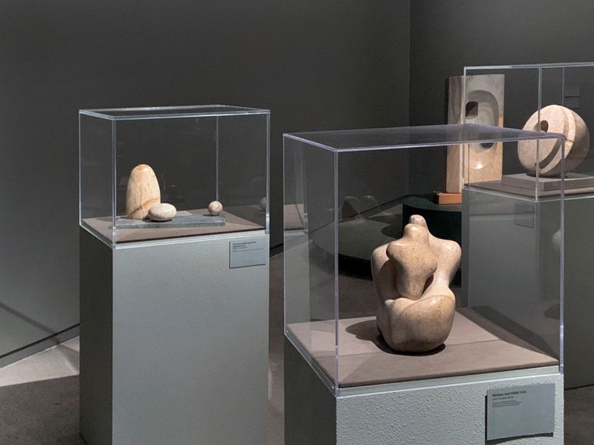 Installation view of the exhibition 'Barbara Hepworth: In Equilibrium' at the Heide Museum of Modern Art, Melbourne showing at left 'Three Forms (Carving in Grey Alabaster)' 1935; at centre 'Mother and Child' 1934; and at right 'Pierced Hemisphere II' 1937-1938