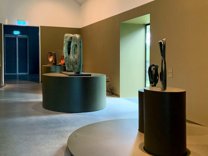 Installation view of the exhibition 'Barbara Hepworth: In Equilibrium' at the Heide Museum of Modern Art, Melbourne showing at centre 'Twin Forms in Echelon' 1961; and at right 'Maquette (Variation on a Theme)' and 'Figure (Oread)' both 1958