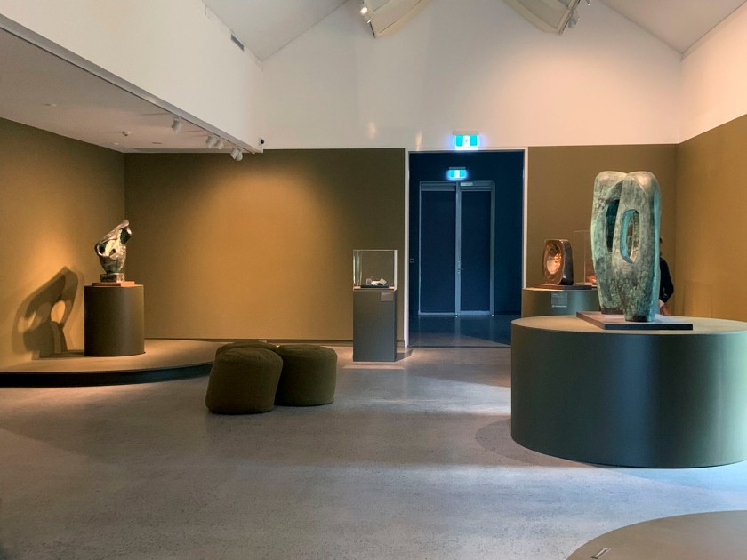 Installation view of the exhibition 'Barbara Hepworth: In Equilibrium' at the Heide Museum of Modern Art, Melbourne showing at left 'Sea Form (Porthmeor)' 1958; and at right 'Twin Forms in Echelon' 1961