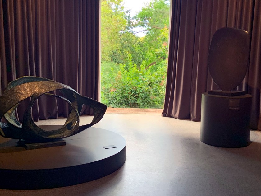 Installation view of the exhibition 'Barbara Hepworth: In Equilibrium' at the Heide Museum of Modern Art, Melbourne showing at left 'Oval form (Trezion)' 1964; and at right 'Single Form (Chûn Quoit)' 1961