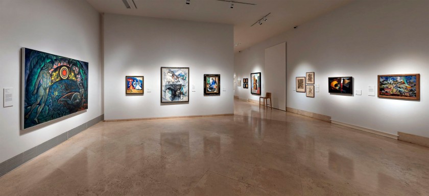 Installation view of the exhibition 'In the Eye of the Storm: Modernism in Ukraine, 1900-1930s' at the Thyssen-Bornemisza Museum, Madrid showing at left, Wladimir Baranoff-Rossiné's 'Adam and Eve' 1912; and at second right, El Lissitzky's 'Composition' 1918-1920s