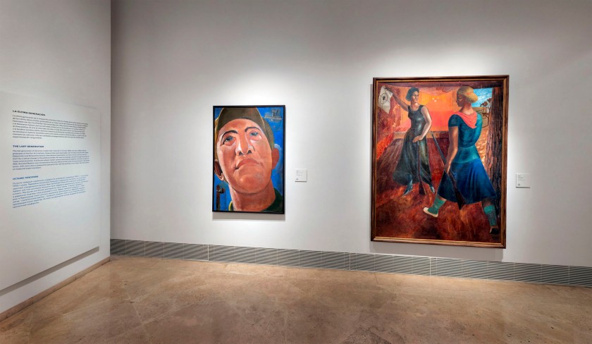 Installation view of the exhibition In the 'Eye of the Storm: Modernism in Ukraine, 1900-1930s' at the Thyssen-Bornemisza Museum, Madrid showing at left, Kostiantyn Yeleva's 'Portrait Late' 1920s - early 1930s; and at right, Semen Yoffe's 'In the Shooting Gallery' 1932