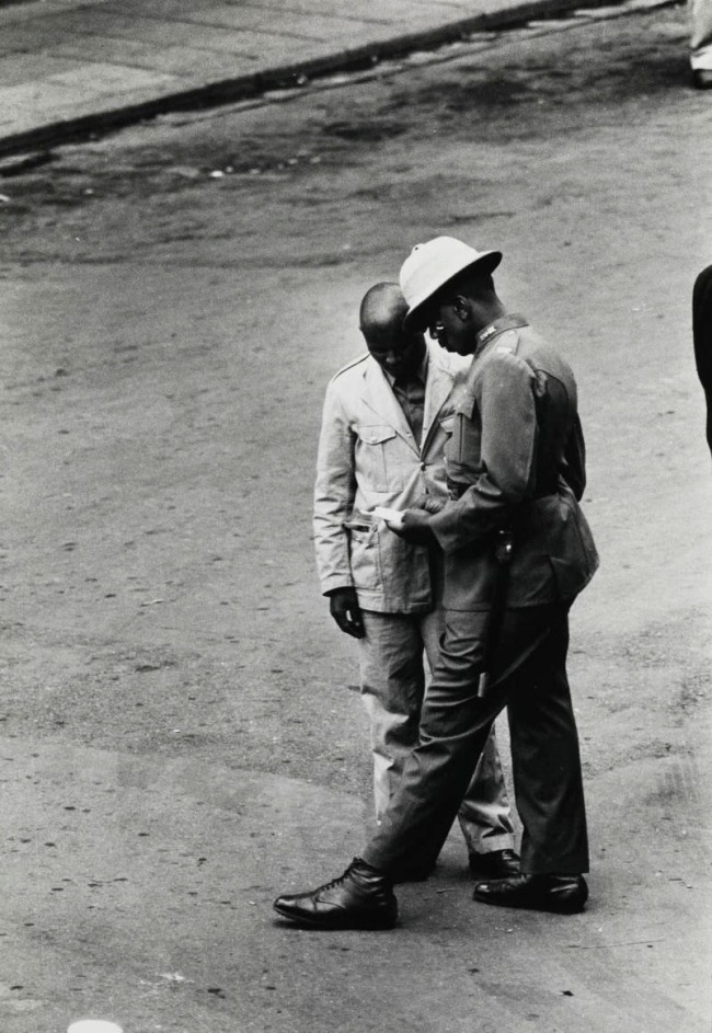 Ernest Cole (South African, 1940-1990) 'Untitled (Police and Passes)' 1960-1966