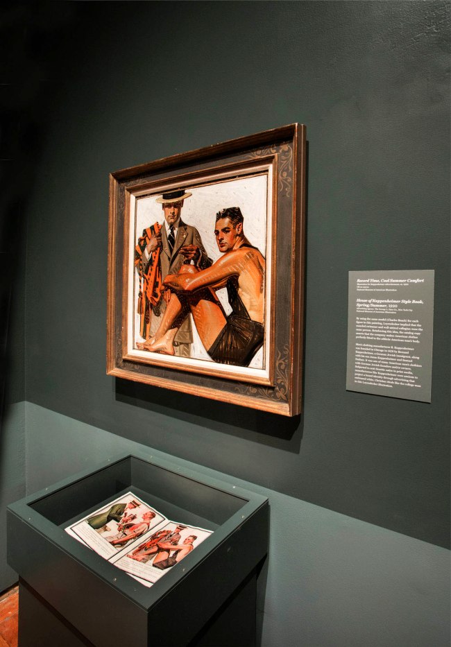 Installation view of the exhibition 'Under Cover: J.C. Leyendecker and American Masculinity' at the New-York Historical Society showing 'Record Time, Cool Summer Comfort' (c. 1920)
