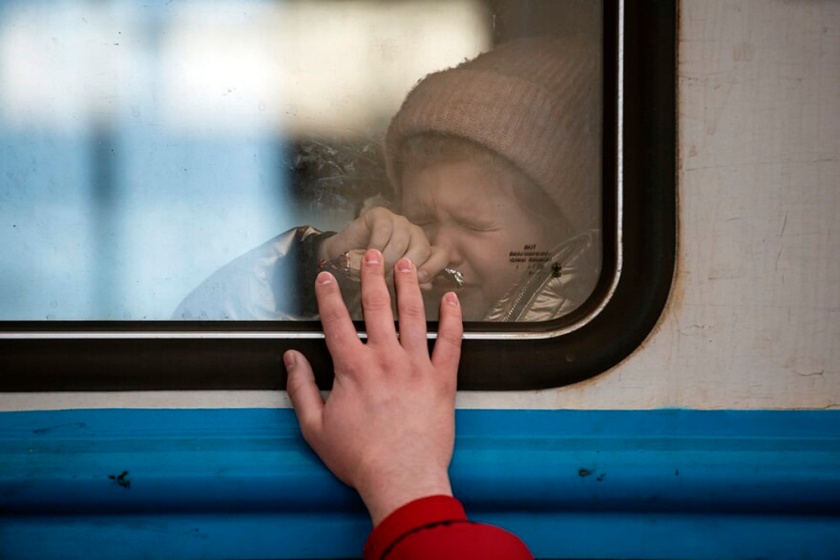 Alexey FurmanAlexey Furman (Ukrainian, b. 1991) / Getty Images 'A young girl cries as a man bids his daughter goodbye at the railway station in Lviv, Ukraine, on March 22, 2022. Lviv has served as a stopover and shelter for the millions of Ukrainians fleeing the Russian invasion, either to the safety of nearby countries or the relative security of western Ukraine' 2022