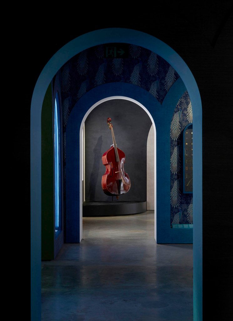 Installation view of the exhibition '1,001 Remarkable Objects' at Powerhouse Ultimo, Sydney showing John Devereux's Double bass (1856)