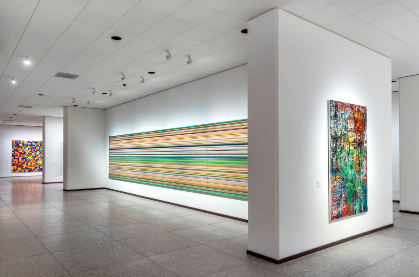 Installation view of the exhibition 'Gerhard Richter. 100 Works for Berlin', State Museums in Berlin, Neue Nationalgalerie, April 1, 2023 to 2026 showing at left, Richter's work 'Strip (930-3)' (2013/2016, below)