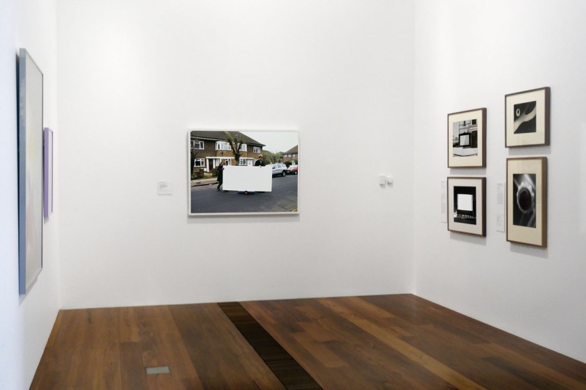 Installation view of the exhibition 'Photography: Real & Imagined' at The Ian Potter Centre: NGV Australia, Melbourne showing at centre, David Thomas' 'The Movement of Colour (White), Taking a Monochrome for a Walk (London)' (2010-2011)