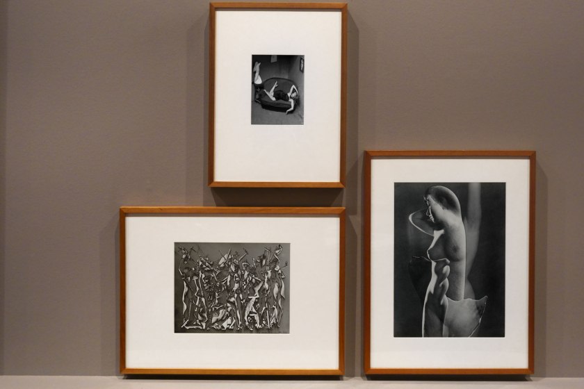 Installation view of the exhibition 'Photography: Real & Imagined' at The Ian Potter Centre: NGV Australia, Melbourne showing at bottom left, Raoul Ubac's 'Penthésilée' (c. 1938, below); at top centre, André Kertész's Satiric Dancer, Paris (1926, below); and at right, Max Dupain's 'Impassioned clay' (1936, below)