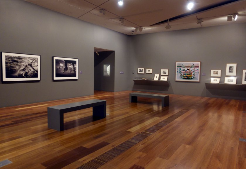 Installation view of the exhibition Photography: Real & Imagined at The Ian Potter Centre: NGV Australia, Melbourne showing at left, Narelle Autio's two photographs 'Untitled' from 'The Seventh Wave' series (1999-2000); and at right, Selina Ou's 'Convenience' (2001)