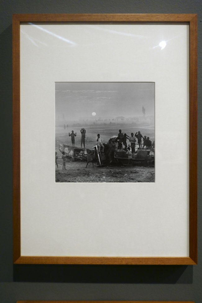 Installation view of the exhibition 'Photography: Real & Imagined' at The Ian Potter Centre: NGV Australia, Melbourne showing David Goldblatt's 'The playing fields of Tladi, Soweto, Johannesburg, August 1972'