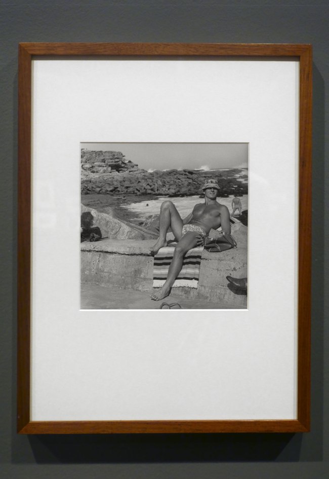 Installation view of the exhibition 'Photography: Real & Imagined' at The Ian Potter Centre: NGV Australia, Melbourne showing John Williams' 'Clovelly Beach, Sydney' (1969)