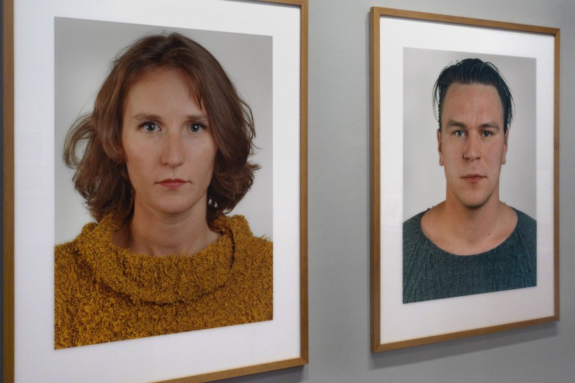 Installation view of the exhibition Photography: Real & Imagined at The Ian Potter Centre: NGV Australia, Melbourne showing at left, Thomas Ruff’s 'Portrait (V. Liebermann D)' (1999); and at right, Ruff's 'Portrait (A. Koschkarow)' (2000)