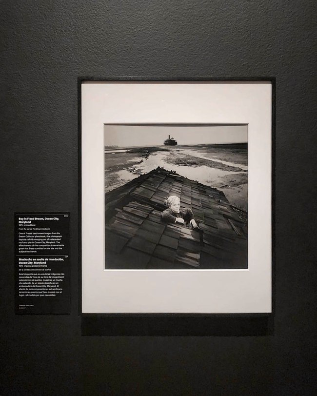 Installation view of the exhibition Arthur Tress: Rambles, Dreams, and Shadows at the J. Paul Getty Museum, Los Angeles showing 'Boy in Flood Dream, Ocean City, Maryland' (1971)