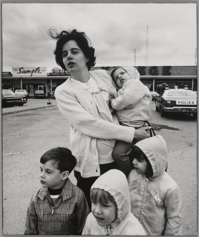Arthur Tress (American, b. 1940) 'Woman in Shopping Center Parking Lot, Lackawanna, New York' 1970