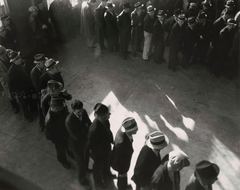 Dorothea Lange (American, 1895-1965) 'Line of men inside a division office of the State Employment Service office at San Francisco, California, waiting to register for unemployment benefits January' 1938, printed c. 1960s