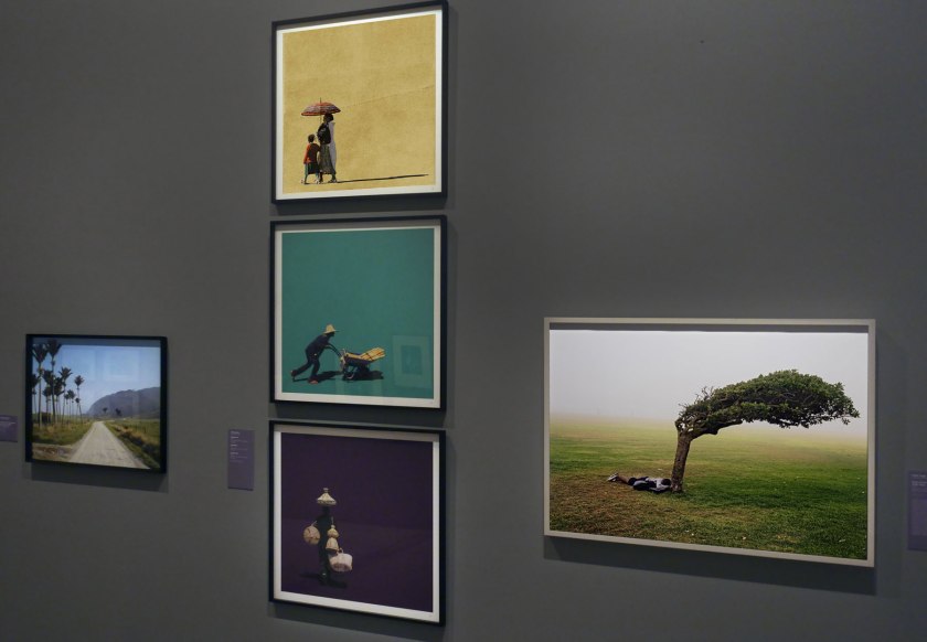 Installation view of the exhibition 'Photography: Real & Imagined' at The Ian Potter Centre: NGV Australia, Melbourne showing at centre, Girma Berta's 'Untitled IV, VI and XII' (2017) at right, Pieter Hugo's 'Green Point Common, Cape Town' (2013)