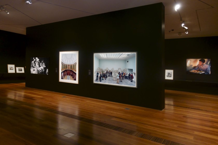 Installation view of the exhibition 'Photography: Real & Imagined' at The Ian Potter Centre: NGV Australia, Melbourne showing at middle left, Anne Ferran's 'Scenes on the death of nature, III' (1986); at centre, Candida Höfer's 'Teylers Museum Haarlem II' (2003, below); and at middle right, Thomas Struth's 'Pergamon Museum IV, Berlin' (2001)