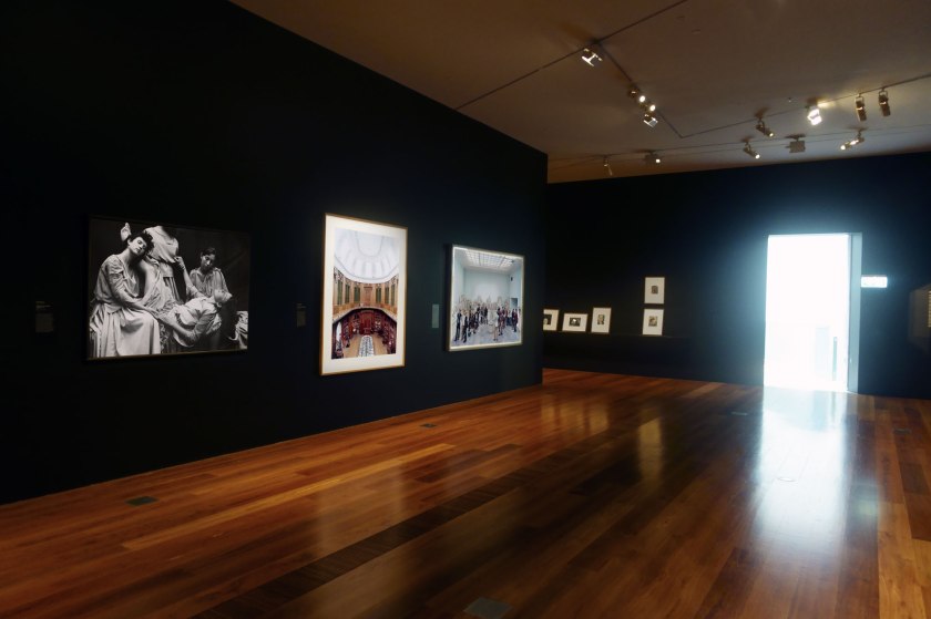 Installation view of the exhibition 'Photography: Real & Imagined' at The Ian Potter Centre: NGV Australia, Melbourne showing at left, Anne Ferran's 'Scenes on the death of nature, III' (1986); at centre, Candida Höfer's 'Teylers Museum Haarlem II' (2003); and at right, Thomas Struth's 'Pergamon Museum IV, Berlin' (2001)