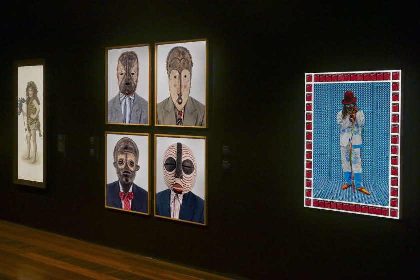 Installation view of the exhibition 'Photography: Real & Imagined' at The Ian Potter Centre: NGV Australia, Melbourne showing at left Alice Mills' 'Joan Margaret Syme' (c. 1918); at centre, works by Edson Chagas from his 'Tipo Passe' series (2014); and at right, Hassan Hajjaj's 'Master Cobra Mansa' (2013)