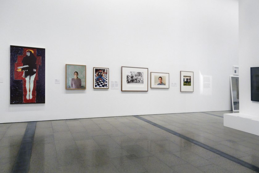 Installation view of the exhibition 'Photography: Real & Imagined' at The Ian Potter Centre: NGV Australia, Melbourne showing at left, Julie Rrap's 'Madonna' (1984, above); at second left, Siri Hayes' 'Spilling pearls' (2012); at third left, Sarah Lucas' 'Self-portrait with fried eggs' (1999); at fourth left, William Yang's 'William, Father, Mother, Graceville, Brisbane' (1974) and then his 'Self Portrait #5' (2008)