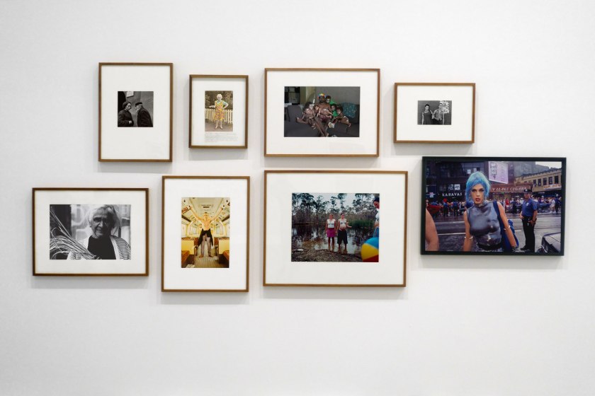 Installation view of the exhibition 'Photography: Real & Imagined' at The Ian Potter Centre: NGV Australia, Melbourne showing from left to right, Ellen José's 'Basket Weaver, Lake Tyers' (1988); Roman Vishniac's 'Grandfather and granddaughter, Warsaw' (c. 1935-1938); Wolfgang Tillmans' 'Lars in tube' (1993); Ruth Maddison's 'Molly O'Sullivan, 82' (1990); Naomi Hobson's 'The God Father' (2021); Donna Bailey's 'Lush' (2002); Carol Jerrems 'Sharpies' (1976); and Nan Goldin's 'Misty in Sheridan Square, NYC' (1991)