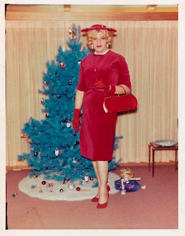 Attributed to Andrea Susan. 'Gloria in a red suit at home, Clarion, Michigan' 1962