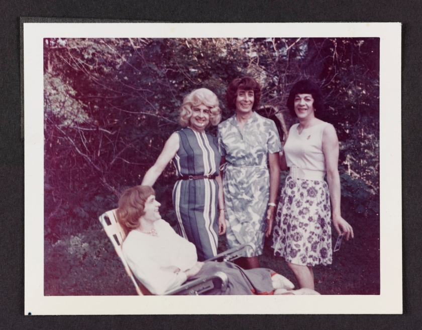 Attributed to Andrea Susan. 'Daphne sitting on a lawn chair with Ann, Susanna, and a friend outside, Casa Susanna, Hunter, NY' 1964-1968